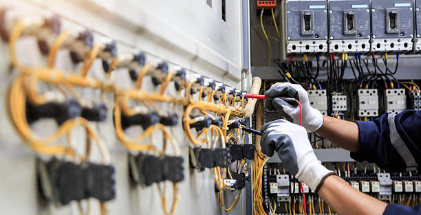 Professional Electrician technician working in Monfort Heights, OH